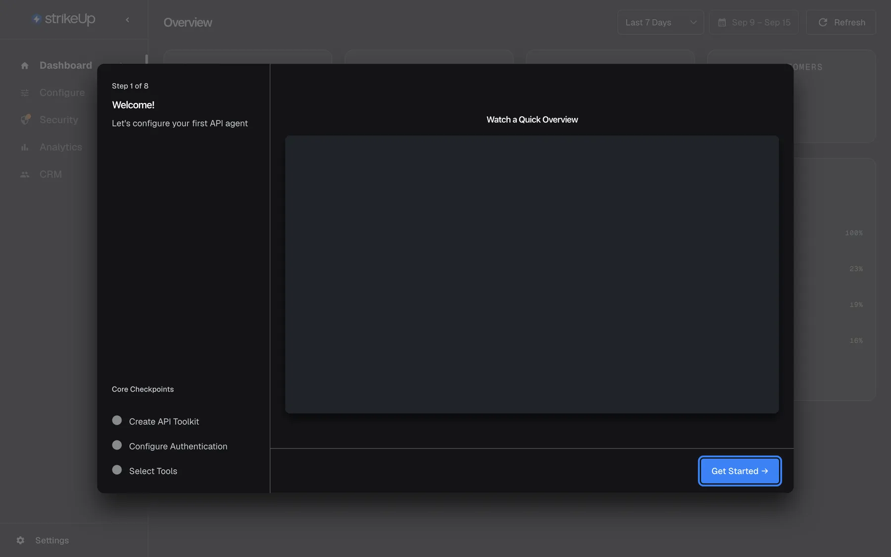 The "Welcome to StrikeUp" setup wizard as it opens over the dimmed dashboard right after sign-up. The left column shows "Step 1 of 8", the title "Welcome!", the line "Let's configure your first API agent" and, at the bottom, "Core Checkpoints" with three grey circles: "Create API Toolkit", "Configure Authentication" and "Select Tools". The right side holds "Watch a Quick Overview" with a video area (shown empty in this screenshot). At the bottom right, the blue "Get Started →" button is highlighted; it opens the API Specification step. The wizard has no close button.