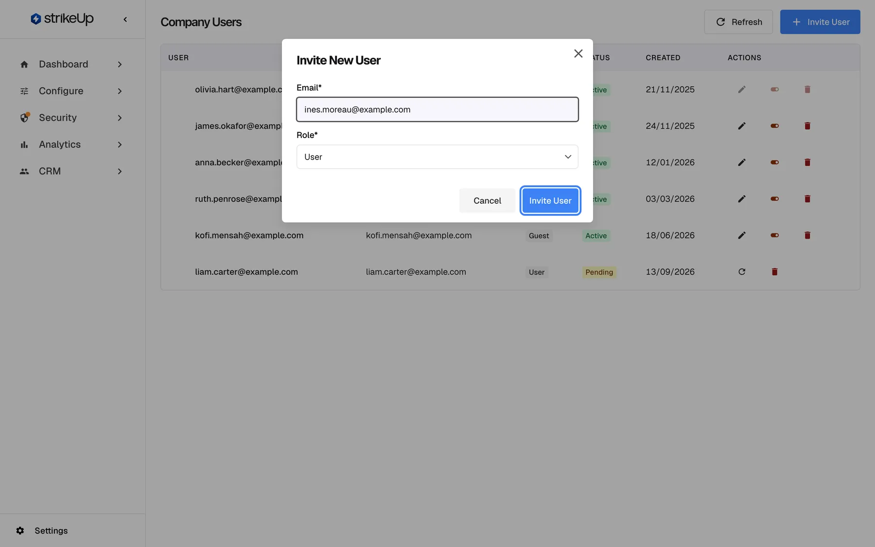 The "Invite New User" dialog over the Company Users page. The Email* field holds ines.moreau@example.com and the Role* selector is set to "User"; the selector only offers User and Admin. At the bottom, "Cancel" and the highlighted "Invite User" button. Inviting sends an email with a link that is valid for seven days; the person appears in the list as Pending until they accept.