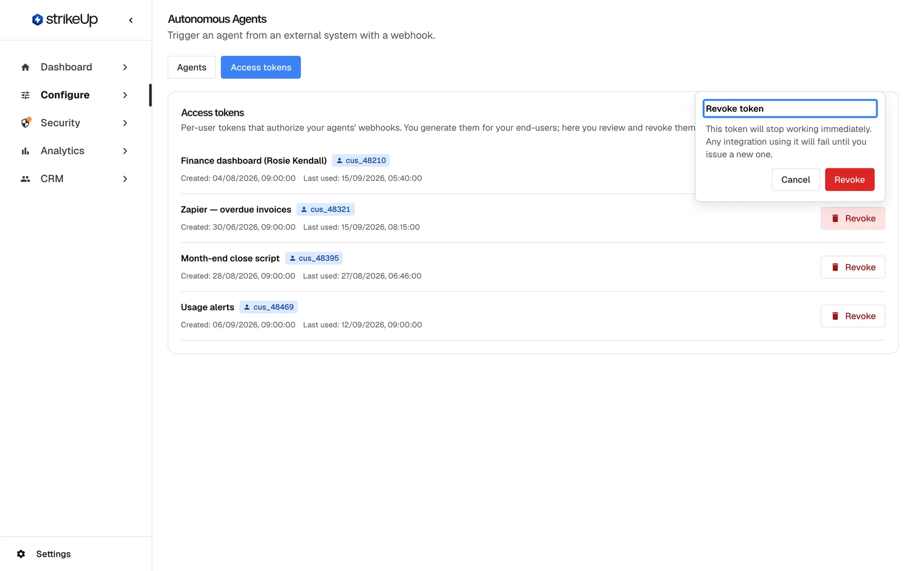 The "Access tokens" tab with a confirmation popover open next to the Revoke button of "Zapier — overdue invoices". The highlighted title "Revoke token" is followed by "This token will stop working immediately. Any integration using it will fail until you issue a new one." and the buttons "Cancel" and "Revoke". A revoked token disappears from the list and cannot be restored.