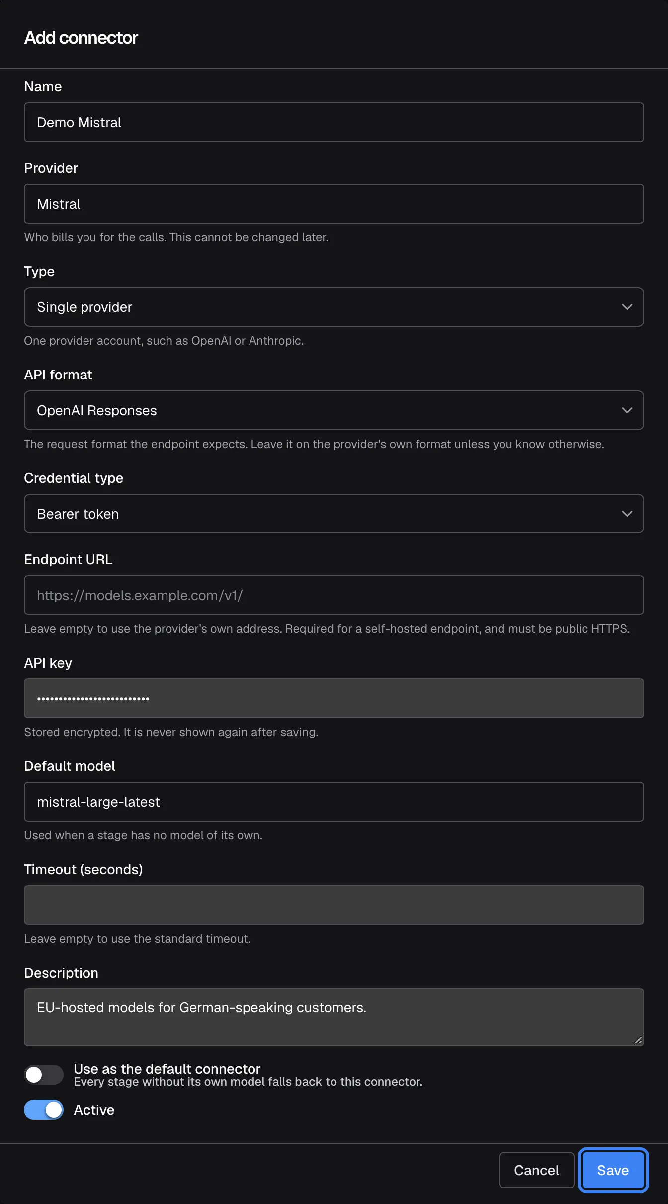 The "Add connector" dialog on the AI Gateway page, filled in: Name "Demo Mistral", Provider "Mistral" with the help text "Who bills you for the calls. This cannot be changed later.", Type "Single provider", API format, Credential type "Bearer token", an API key entered as hidden dots, Default model "mistral-large-latest" and Description "EU-hosted models for German-speaking customers.". The switches "Use as the default connector" and "Active" are at the bottom. The "Save" button in the dialog footer is highlighted; it creates the connector.