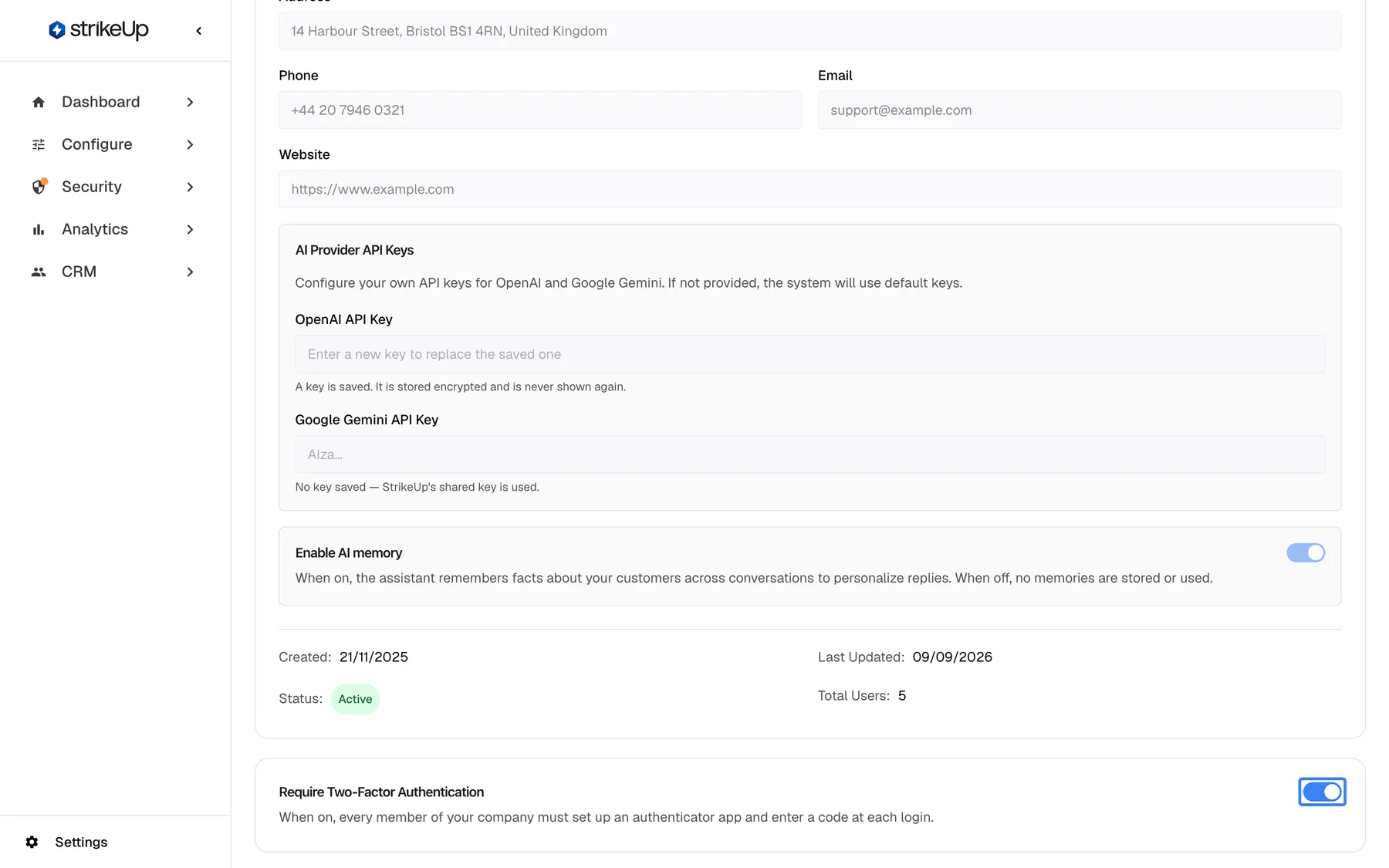 The lower part of the Company Details page in read-only view: "Enable AI memory" (on), then Created 21/11/2025, Last Updated 09/09/2026, Status Active and Total Users 5. Below, the card "Require Two-Factor Authentication" explains that every member of the company must set up an authenticator app and enter a code at each login; its switch is on and highlighted. The switch saves as soon as you change it.