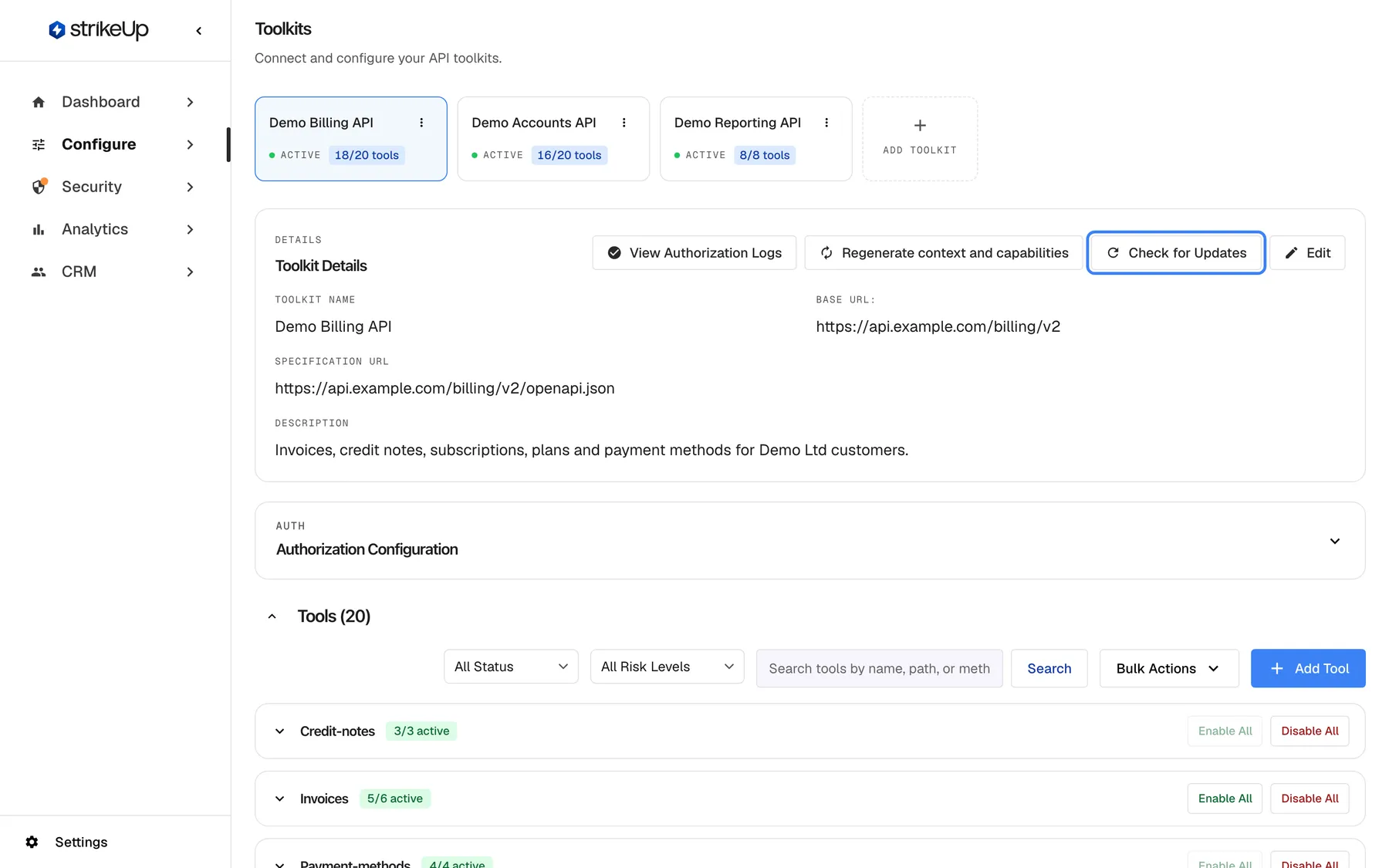 The Toolkits page with the "Demo Billing API" card selected. The "Toolkit Details" panel shows Toolkit Name "Demo Billing API", Base URL "https://api.example.com/billing/v2", Specification URL "https://api.example.com/billing/v2/openapi.json" and the description. At the top right of the panel are "View Authorization Logs", "Regenerate context and capabilities", the highlighted "Check for Updates" button and "Edit". Below sit the collapsed "Authorization Configuration" section and "Tools (20)" with status, risk and search filters, "Bulk Actions", "Add Tool" and the tool groups Credit-notes and Invoices. Check for Updates compares the stored specification with the current one.