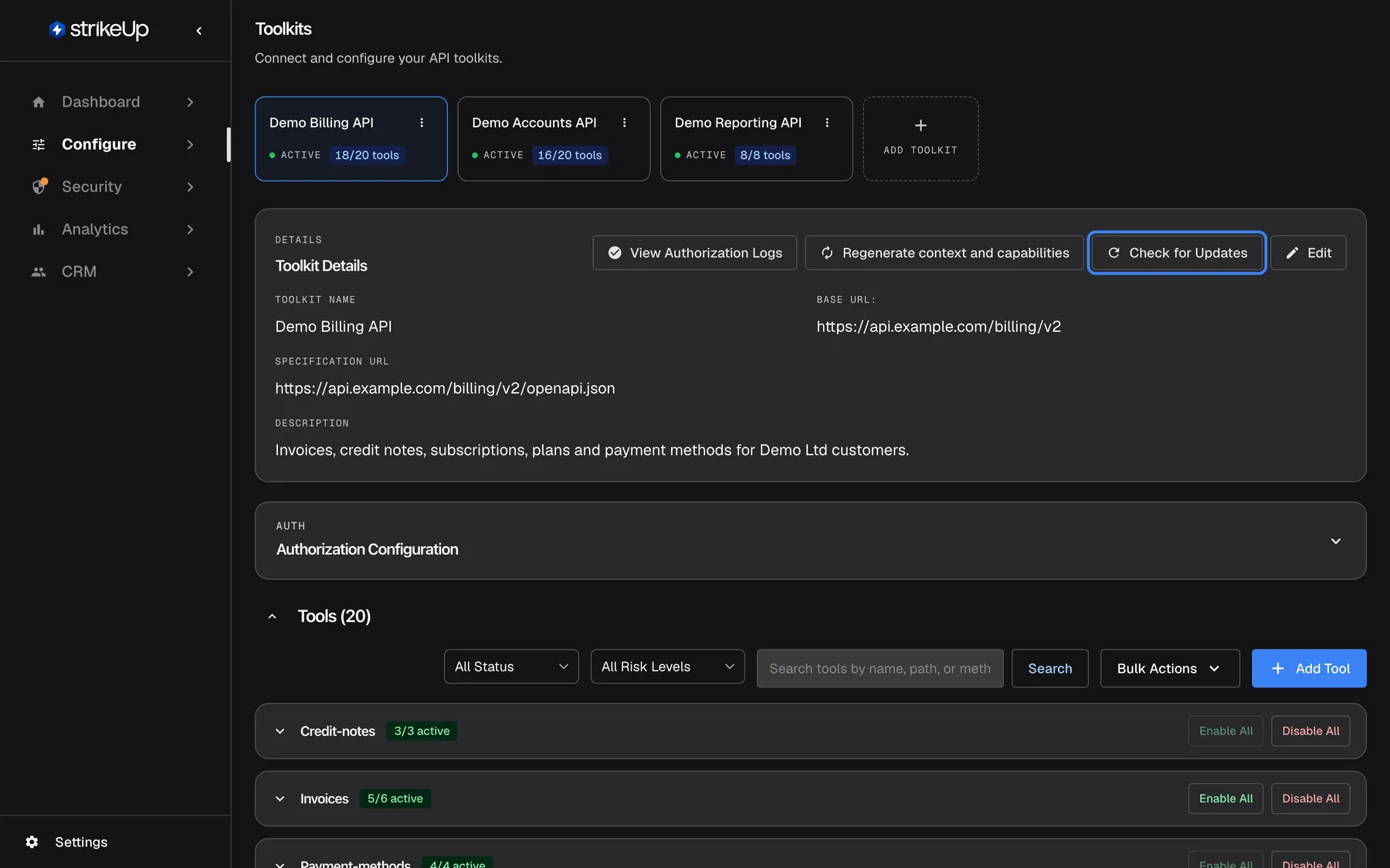 The Toolkits page with the "Demo Billing API" card selected. The "Toolkit Details" panel shows Toolkit Name "Demo Billing API", Base URL "https://api.example.com/billing/v2", Specification URL "https://api.example.com/billing/v2/openapi.json" and the description. At the top right of the panel are "View Authorization Logs", "Regenerate context and capabilities", the highlighted "Check for Updates" button and "Edit". Below sit the collapsed "Authorization Configuration" section and "Tools (20)" with status, risk and search filters, "Bulk Actions", "Add Tool" and the tool groups Credit-notes and Invoices. Check for Updates compares the stored specification with the current one.