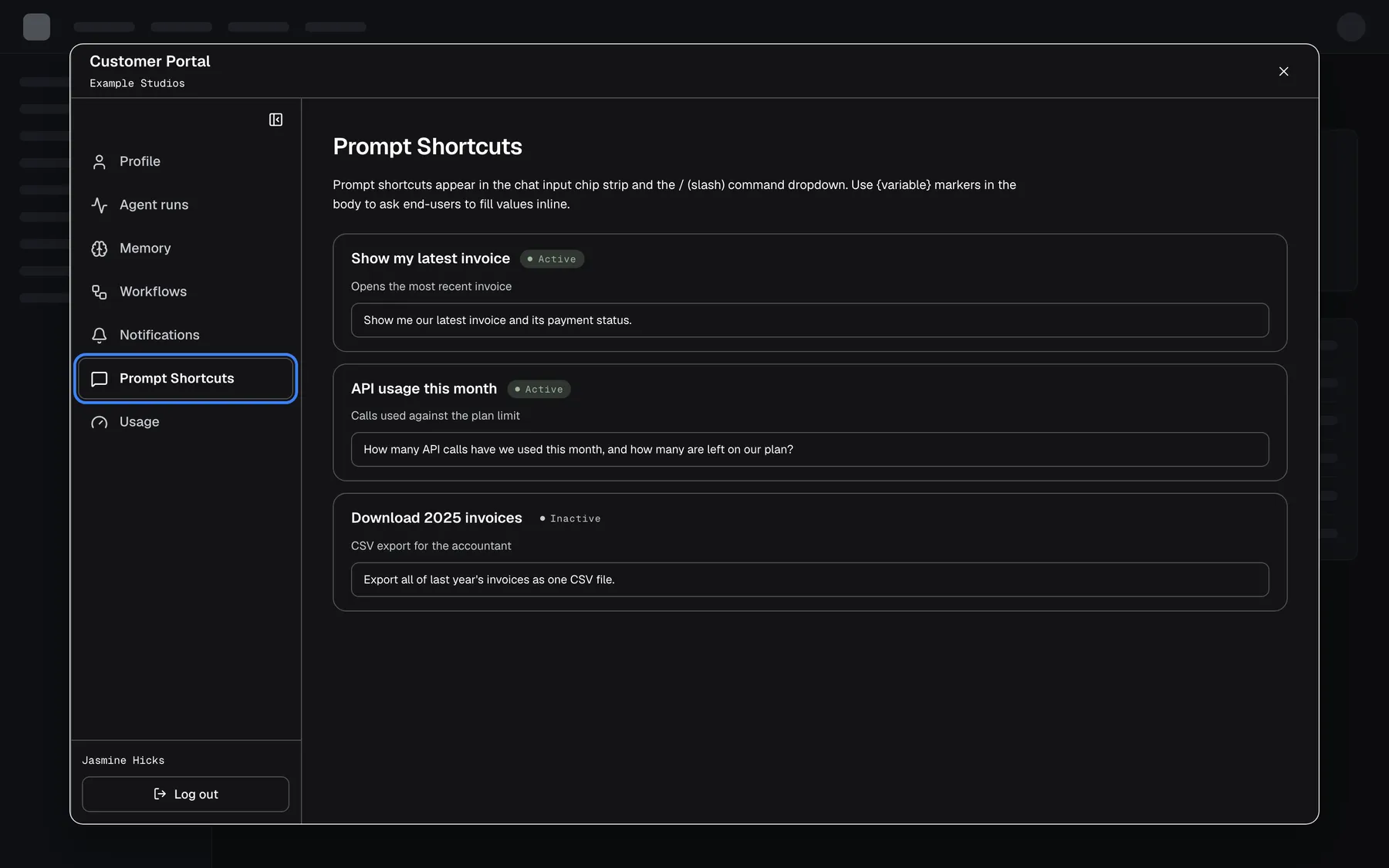 The Customer Portal as seen by Jasmine Hicks, a Member of "Example Studios". Her sidebar has only Profile, Agent runs, Memory, Workflows, Notifications, the highlighted and selected "Prompt Shortcuts" and Usage; Members, Knowledge Base, Skills and Settings are missing. The Prompt Shortcuts page lists the company's shortcuts read-only: "Show my latest invoice" and "API usage this month" (Active) and "Download 2025 invoices" (Inactive), each with its description and prompt text.
