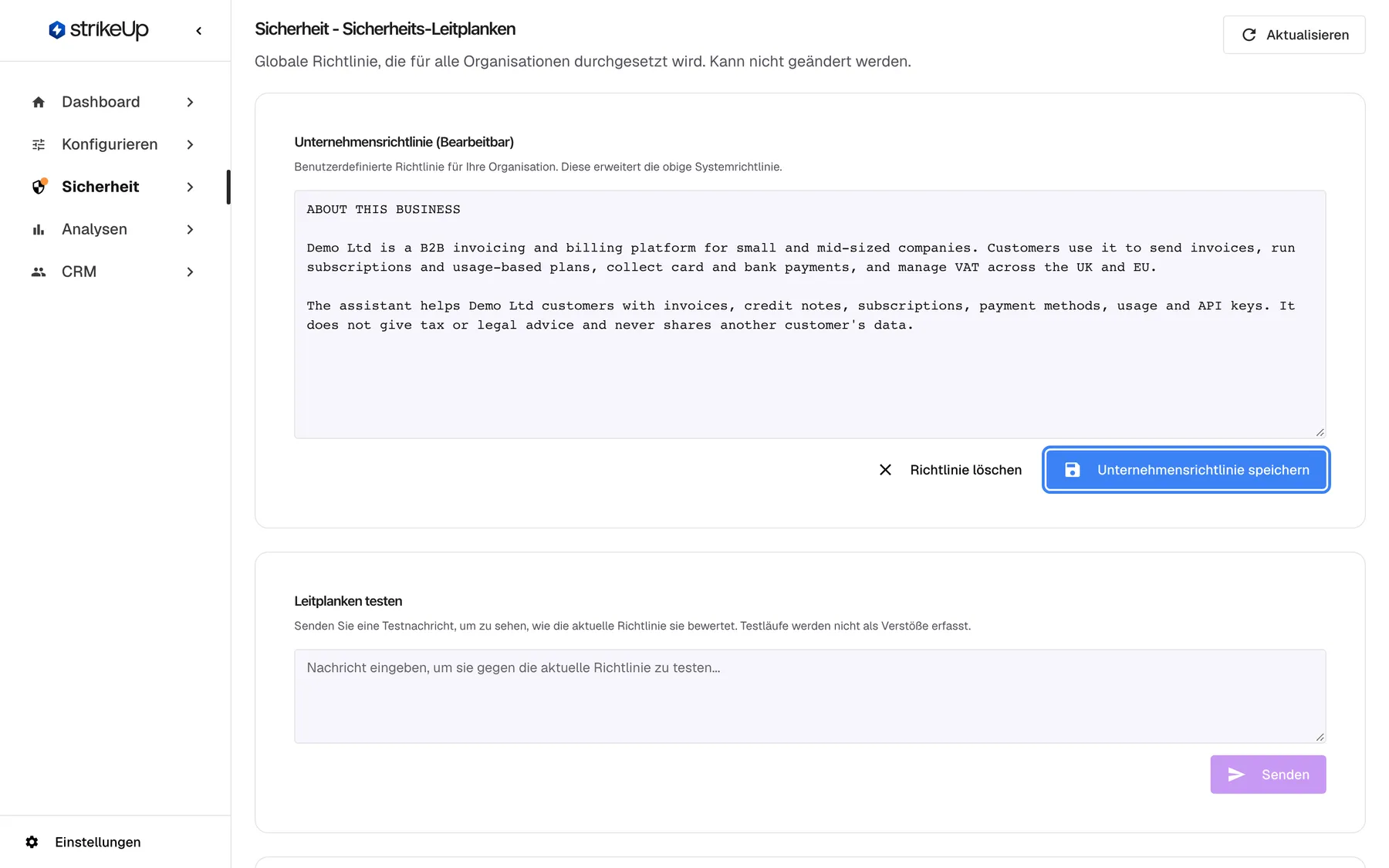 Die Seite „Sicherheit - Sicherheits-Leitplanken“ in StrikeUp. Die Karte „Unternehmensrichtlinie (Bearbeitbar)“ enthält den Richtlinientext von Demo Ltd, der mit „ABOUT THIS BUSINESS“ beginnt und eine B2B-Plattform für Rechnungen und Abonnements beschreibt; der Beispieltext ist auf Englisch. Unter dem Textfeld stehen „Richtlinie löschen“ und die hervorgehobene blaue Schaltfläche „Unternehmensrichtlinie speichern“, die den Text prüft und ihn ab der nächsten Kundennachricht für alle Widgets aktiv schaltet. Darunter beginnt die Karte „Leitplanken testen“.